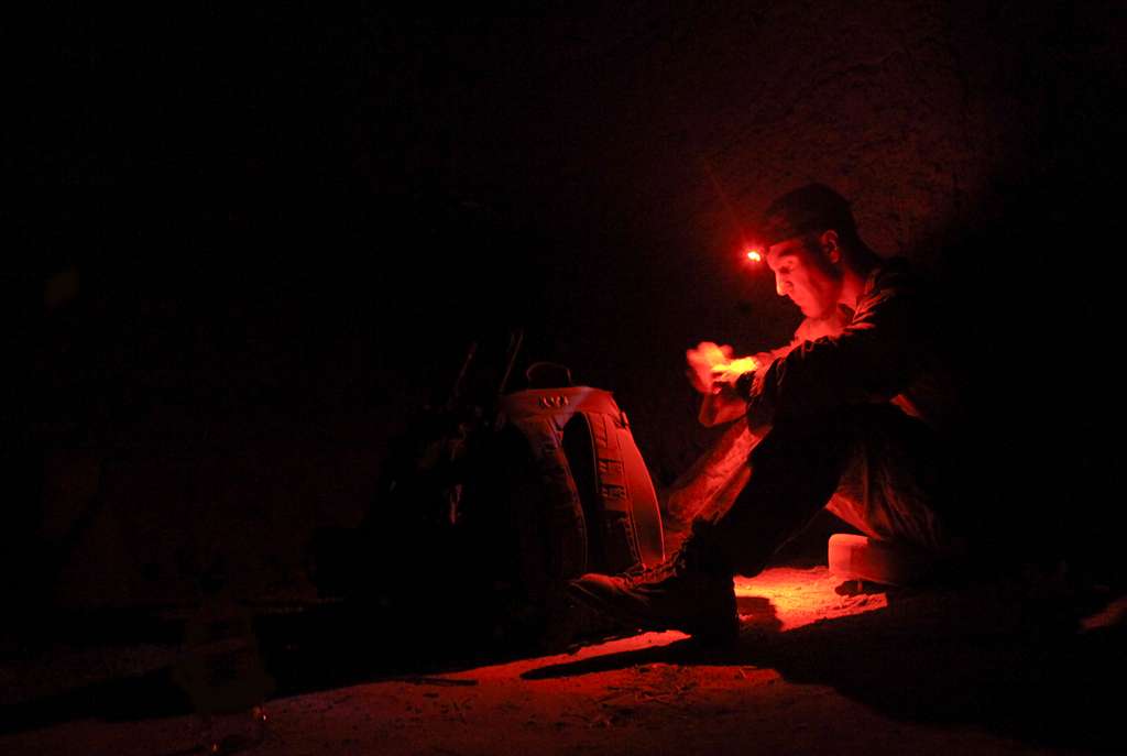 1st lt jerry wells uses a headlamp to eat oatmeal 3aa102 1024